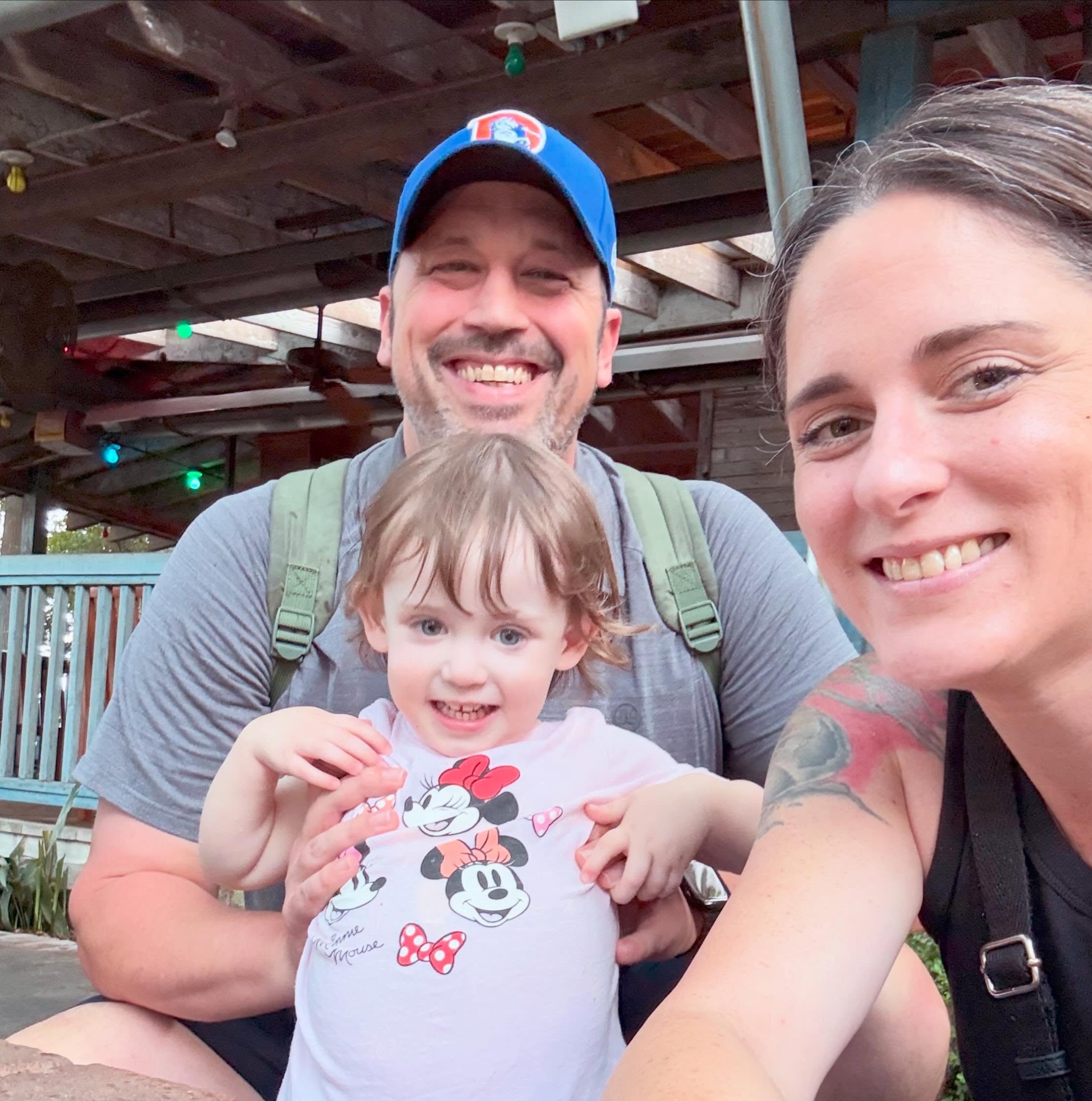 Mandi with her husband and daughter Quinn on a family outing