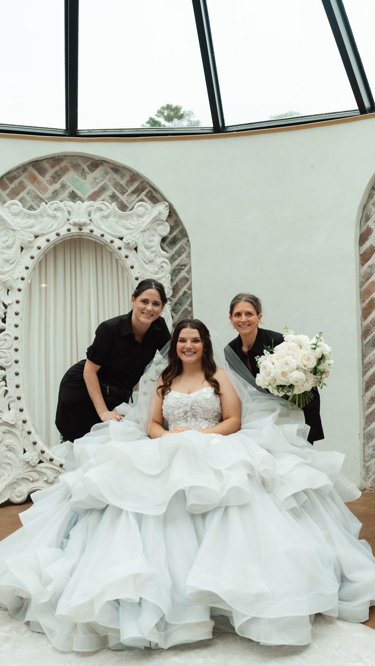 Steph and Mandi with a Lily in June bride